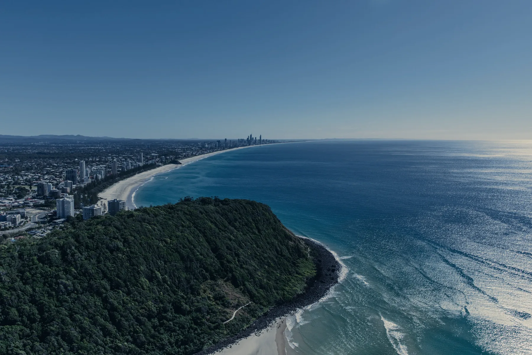 Aerial view along the Gold Coast coastline, looking north over the headland and beaches